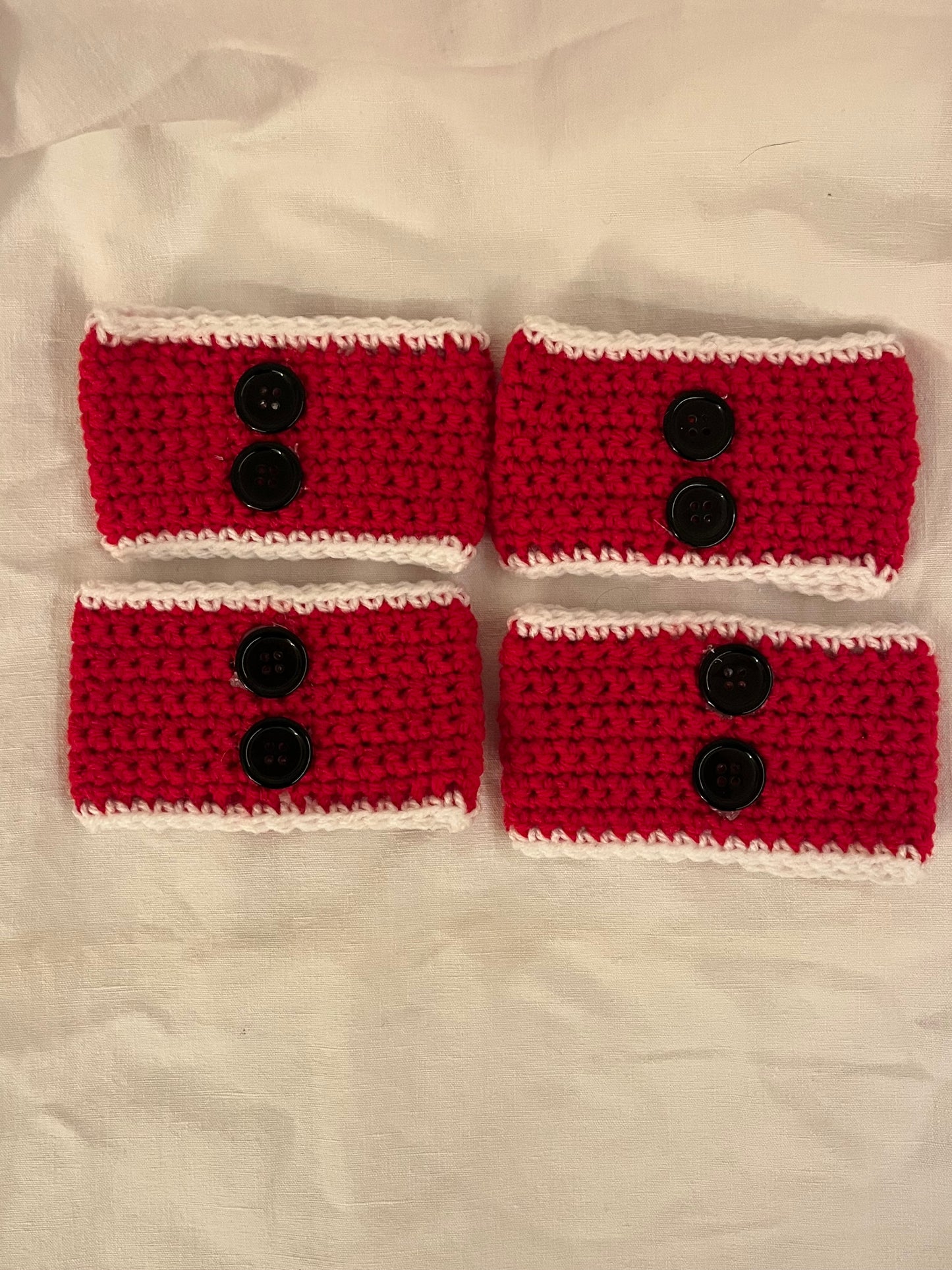 Décoration pour gobelet : veste du Père Noël.